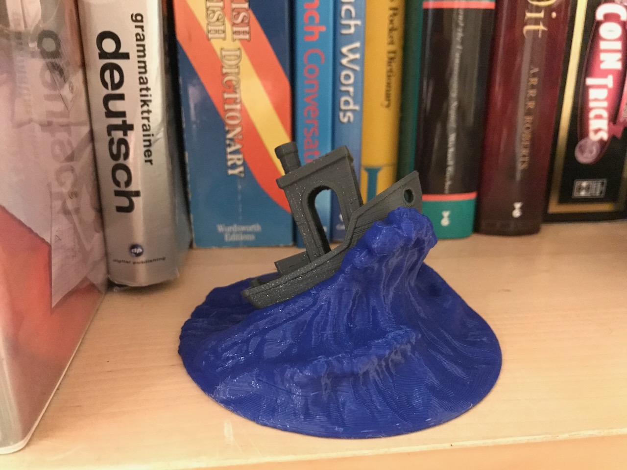 Wave to display a benchy boat