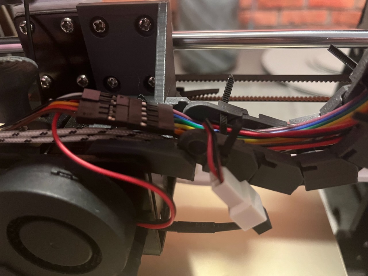 Overheating extruder motor deforming PLA printed extruder chain mount